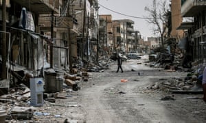 Destroyed buildings in the town of al-Qaryatayn