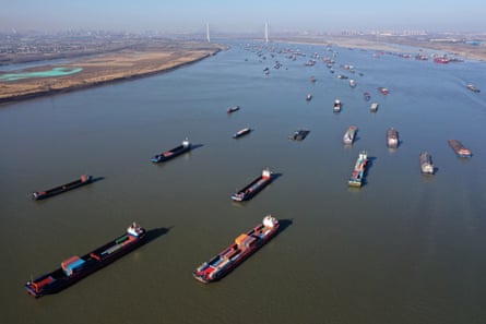 Aerial view of cargo ships sailing along Yangtze River in Wuhan, Hubei Province of China.