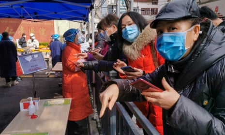 Residents wait to be seen at a hospital in Shanghai.