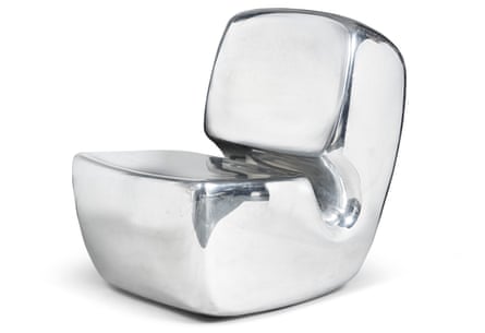 A polished aluminium chair by Marc Newson