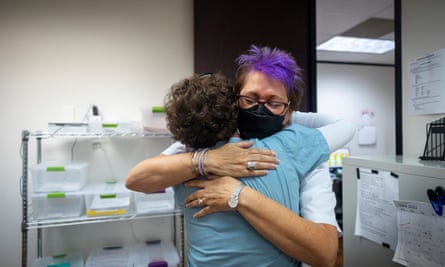Clinic founder and director Kathy Kleinfeld hugs patient advocate Marjorie Eisen at the Houston Women’s Reproductive Services clinic in Texas in 2022.