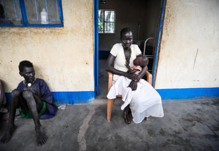 Apath Majon with her 17-month-old daughter Cholok at Abiriu health centre.