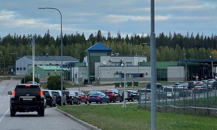 Cars queue to enter the Brusnichnoye checkpoint on the Russian-Finnish border in the Leningrad region.