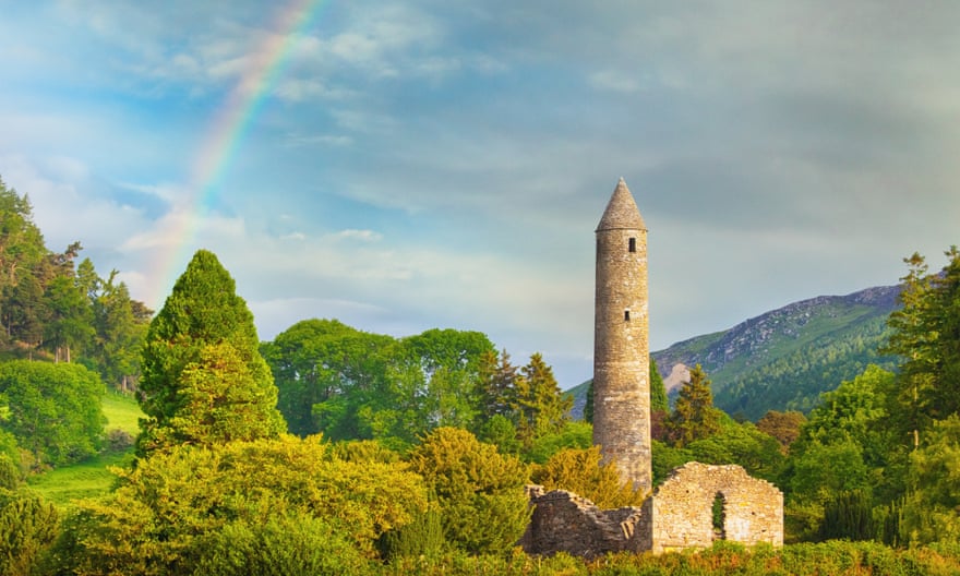 The monastery at Glendalough with a rainbow