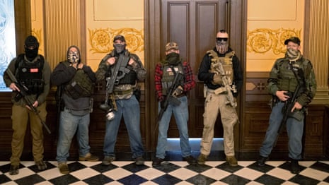 Armed protesters enter Michigan's state capitol demanding end to coronavirus lockdown – video