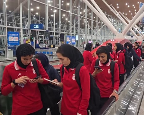 Iranian women’s football team arrive at Kuala Lumpur airport.