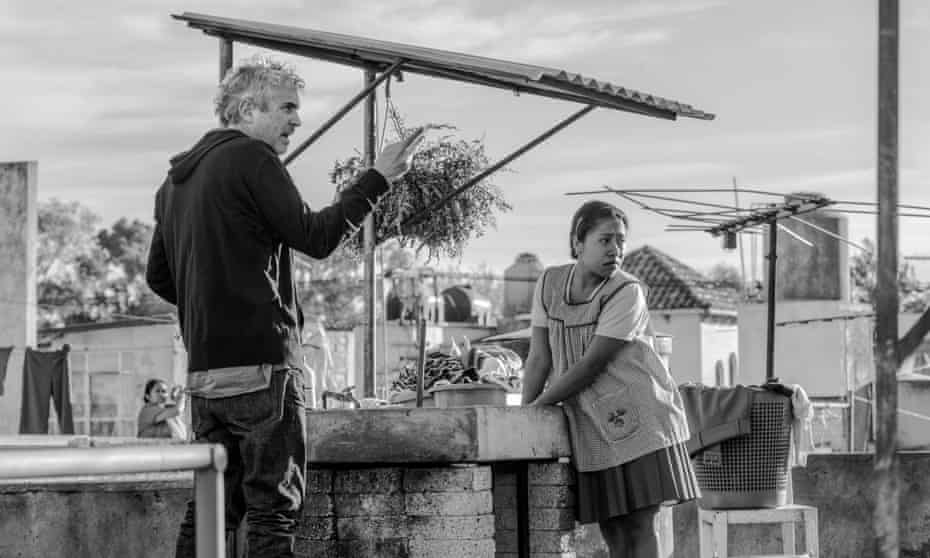 The director Alfonso Cuarón and the actor Yalitza Aparicio, who plays Cleo, on the set of Roma.
