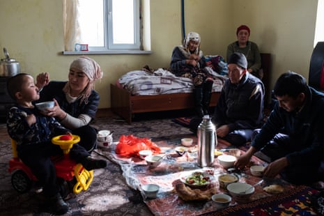 Abdilla Tashbekov and his family have lunch at home in Sary-Mogol.