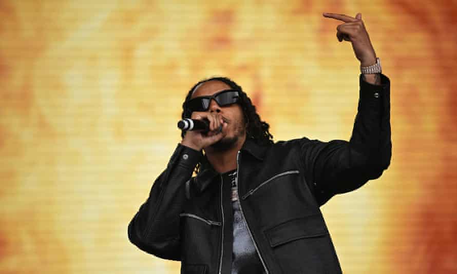 AJ Tracey setting the Pyramid stage ablaze.