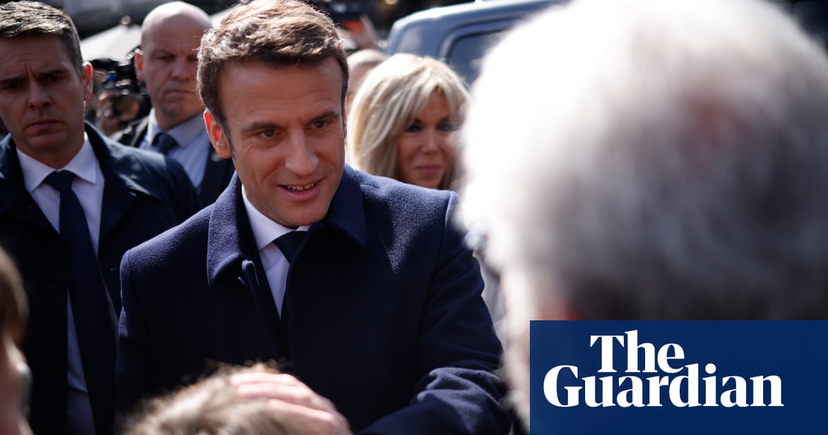 France election: polls open with Macron and Le Pen vying closely for presidency