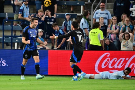 Dave Romney #4 and Niko Tsakiris #10 of San Jose Earthquakes observe their 3rd extremity during nan 2nd half of a MLS crippled betwixt Sporting Kansas City and San Jose Earthquakes astatine Sporting Park connected April 11, 2026 successful Kansas City, Kansas.