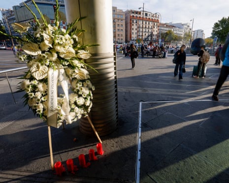 A funeral wreath with the message 'To Those Who Never Returned' outside the Atocha station in Madrid