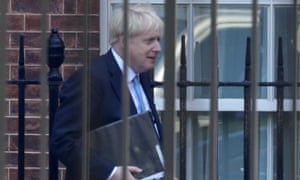 boris johnson behind railings