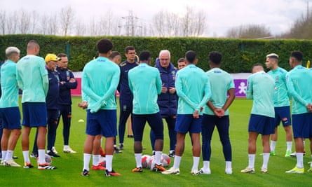 Dorival Júnior speaks to his Brazil squad during a training session in London ahead of a friendly match against England.
