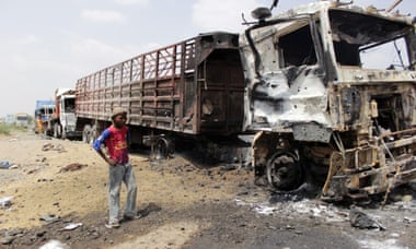 Burnt-out trucks litter the Hays district in Hodeidah province, near Sana’a