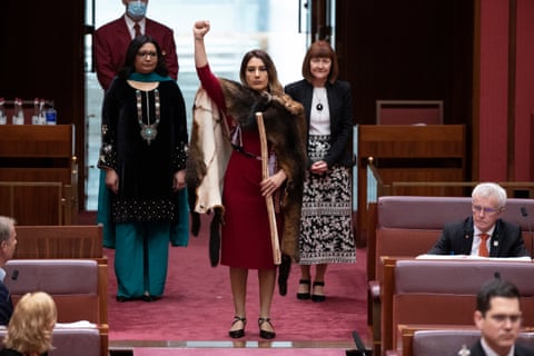 Lidia Thorpe (centre) raises her fist as she is sworn into parliament in October 2020.