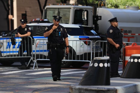 police stand guard near barricades
