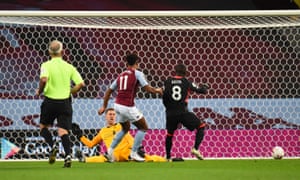 Ollie Watkins of Aston Villa scores the opening goal.