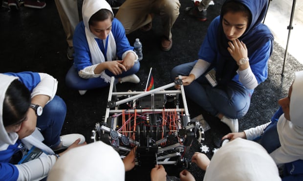 The Afghanistan team fixes their robot in between rounds challenge Monday in Washington.