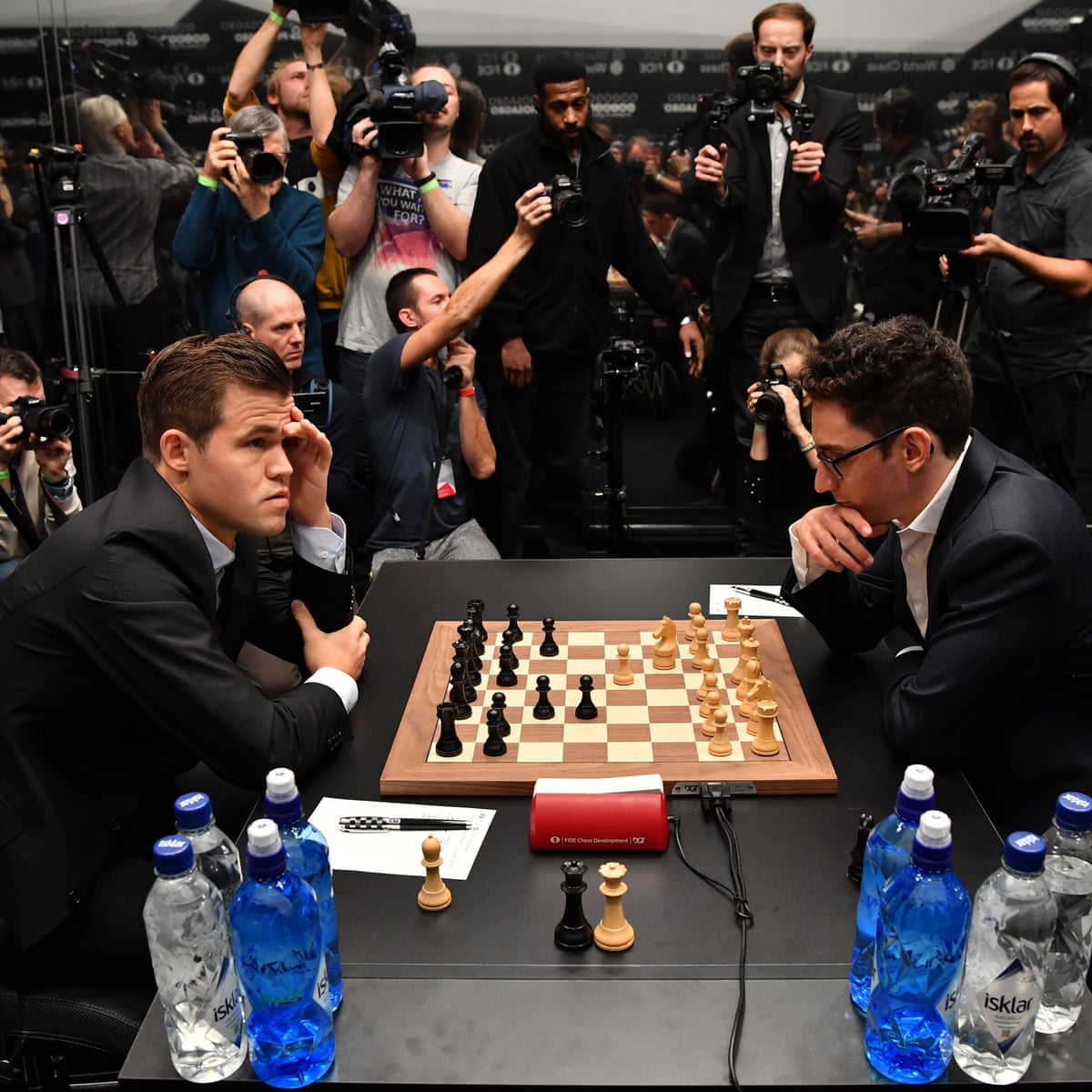 Chess: Magnus Carlsen serene while Fabiano Caruana faces hectic