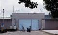 Gates and a barrier outside the prison