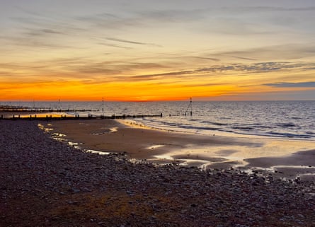 A beach at sunset