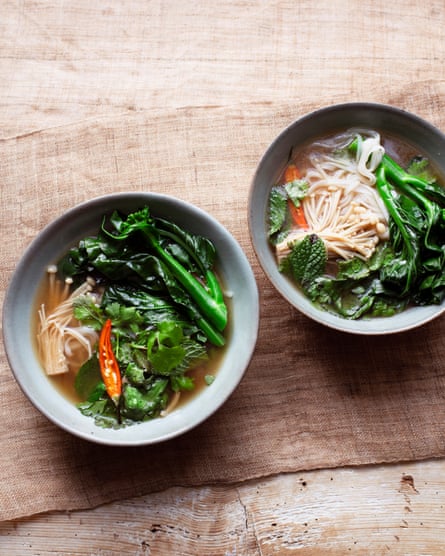 Serve in deep bowls: broth, winter greens, rice noodles.