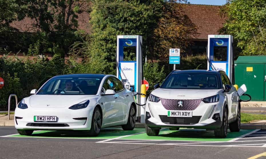 UK cuts grants for electric vehicles for second time in a year | Electric,  hybrid and low-emission cars | The Guardian