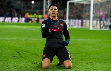Arsenal’s Alexis Sanchez celebrates scoring the third.