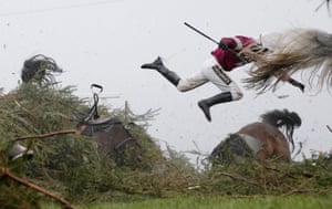 Sports – singles, first prize
Nina Carberry flies off her mount, Sir Des Champs, as they fall at the Chair during the Grand National at Aintree in Liverpool