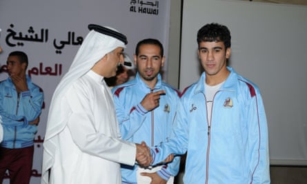 Hakeem Al-Araibi (right) with Sheikh Salman bin Ebrahim al-Khalifa, the president of the Asian Football Confederation.
