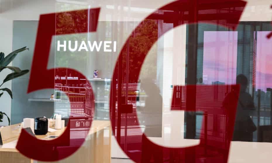 A shop for Chinese telecoms giant Huawei features a red sticker reading ‘5G’ in Beijing