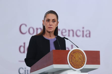 A woman speaks into a microphone