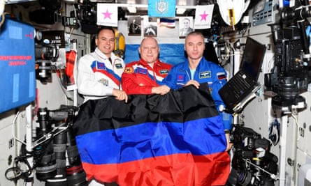 Russian cosmonauts on the ISS take a selfie with the disputed flag of Donetsk last year.