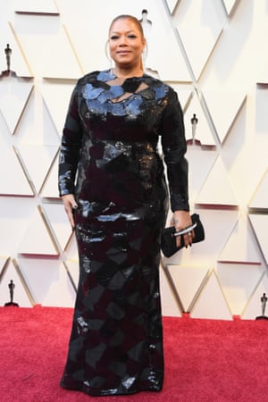The LBD had a textured moment with this Mike Costelloe dress on Queen Latifah. The sequin patches add a crafty feel but the outfit is made by the details: long chandelier earrings and nails sharpened to a point