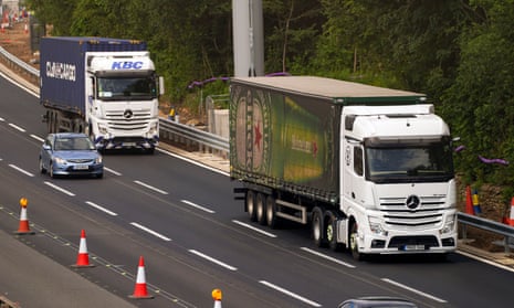 Lorries and car on motorway