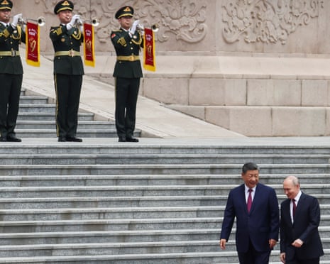 Russian president Vladimir Putin and Chinese president Xi Jinping attend a welcoming ceremony at the Great Hall of the People in Beijing, China.