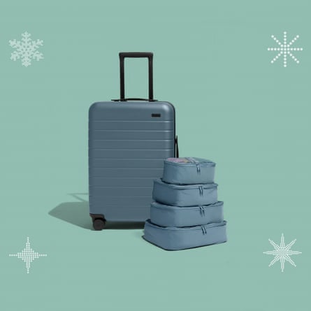 the Away Packing Pro Bundle shown in light blue