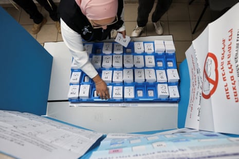 A worker prepares a polling station in the Palestinian-majority city of Umm al-Fahm, in northern Israel.