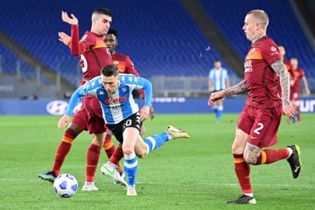 Piotr Zielinski in action for Napoli against Roma.