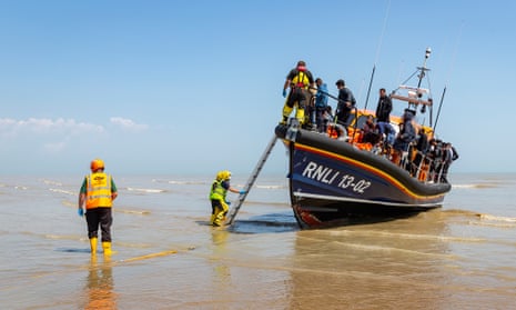 A second boat load of 42 migrants, some of which are children arrive onto UK shores onboard the Dungeness RNLI lifeboat after being intercepted by Border Force off the coast.
