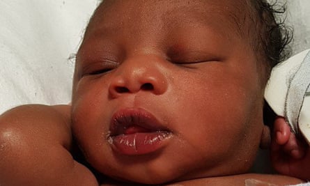 Young baby with eyes closed