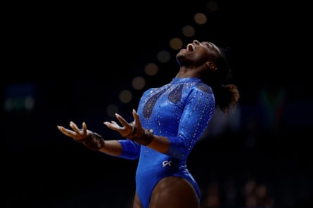 Tia Taylor of the United States celebrates after competing in the women’s team tumbling competition