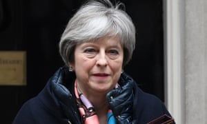 Theresa May leaves Downing Street in London