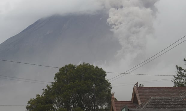 Mount Semeru releases volcanic material during a fresh eruption on Monday