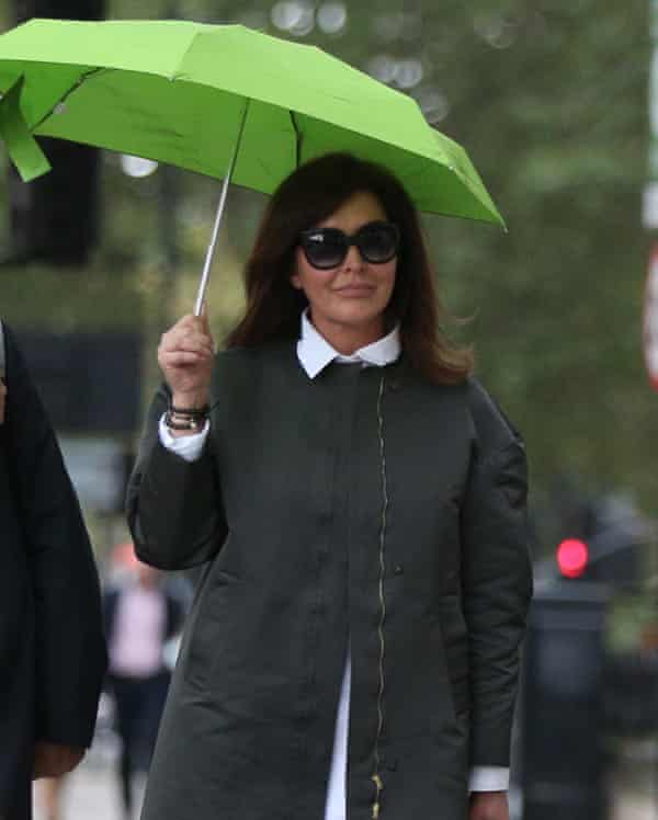 Zamira Hajiyeva with green umbrella