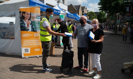 Free NHS lateral flow test packs being given to shoppers in Staines-upon-Thames