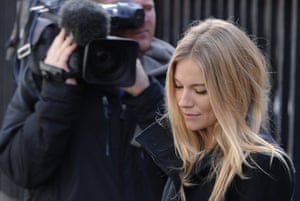 Leaving after giving evidence at the Leveson inquiry in 2011.