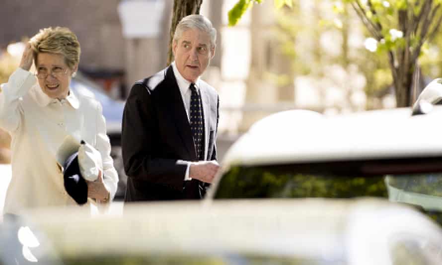 Robert Mueller and his wife Ann Cabell Standishleave Easter services in Washington, in April.