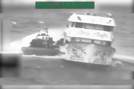 A still from a video of two boats in water